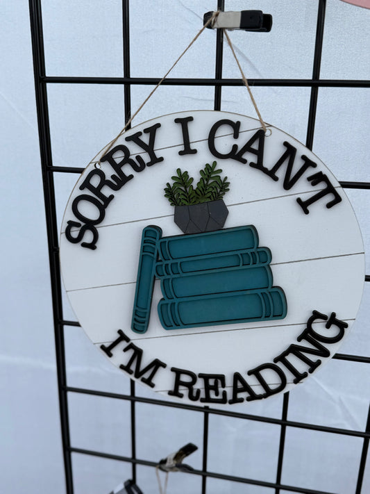 Sorry I Can’t I’m Reading sign